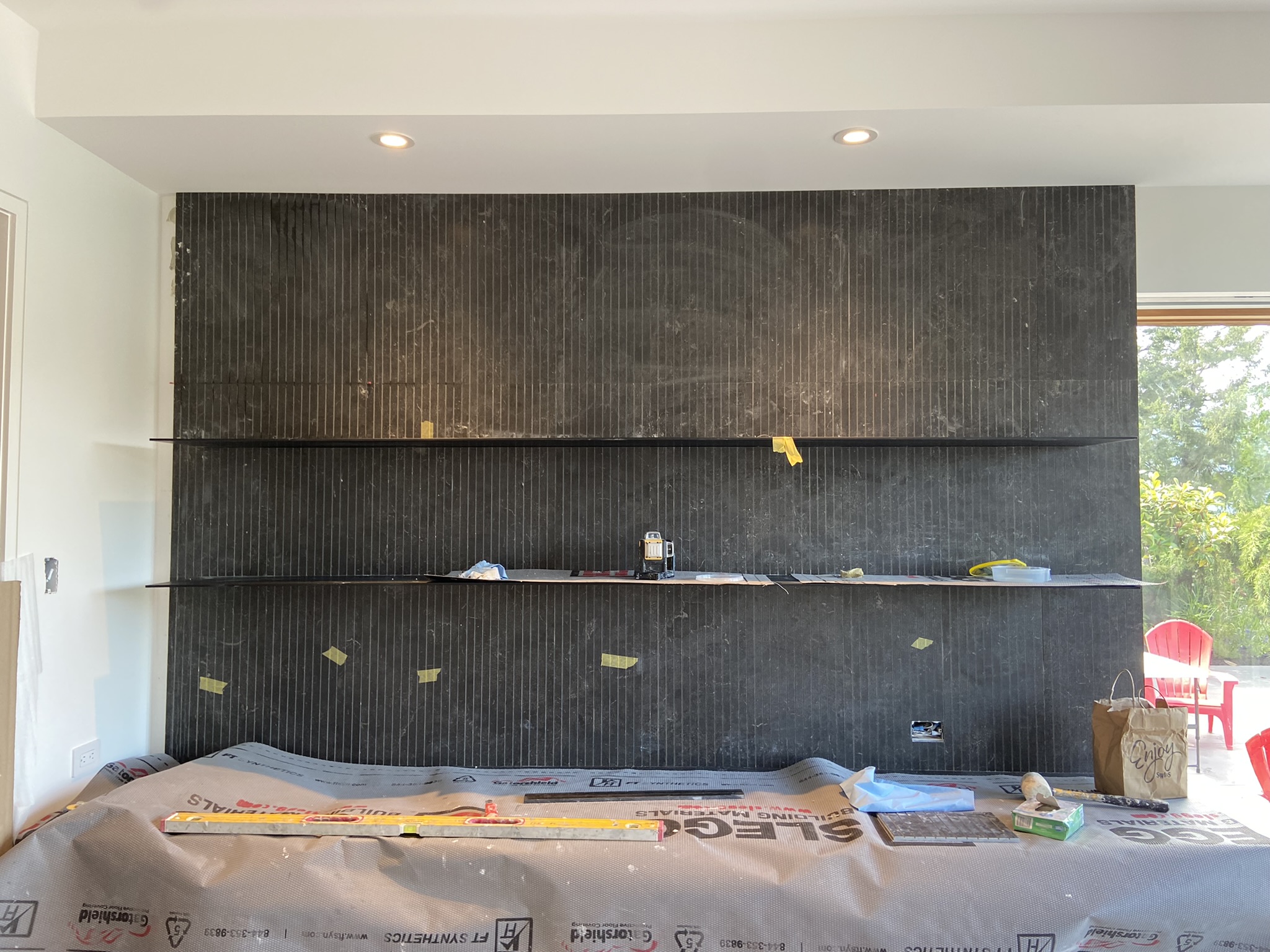 Large format black tile feature wall