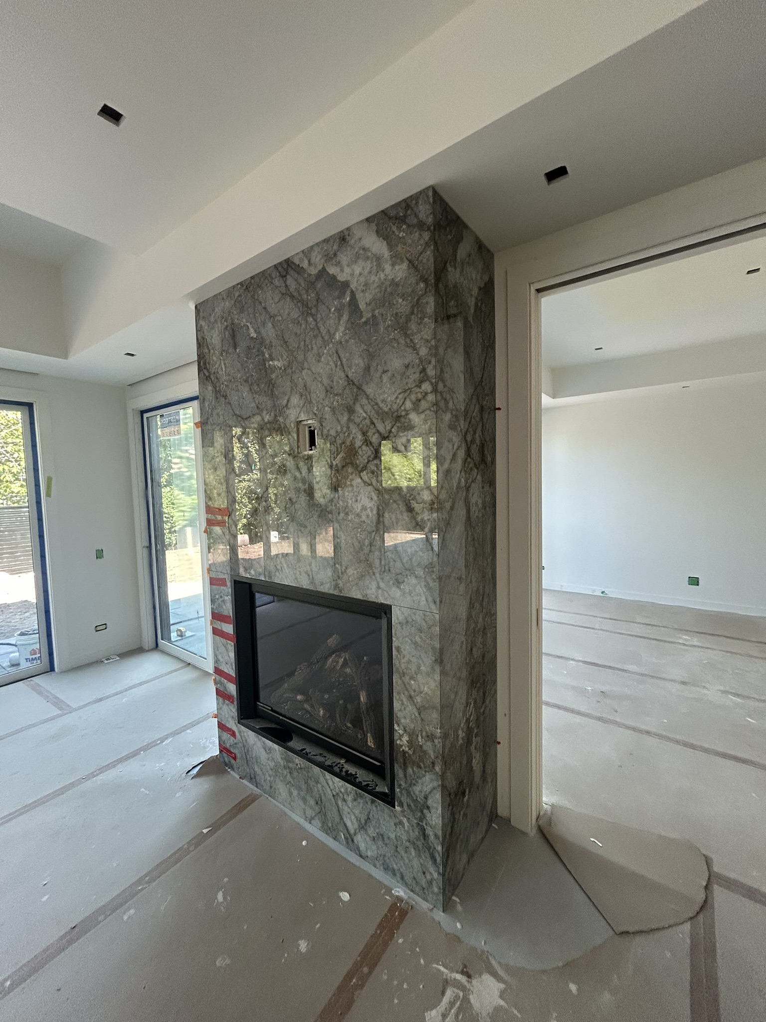 Dramatic marble fireplace surround