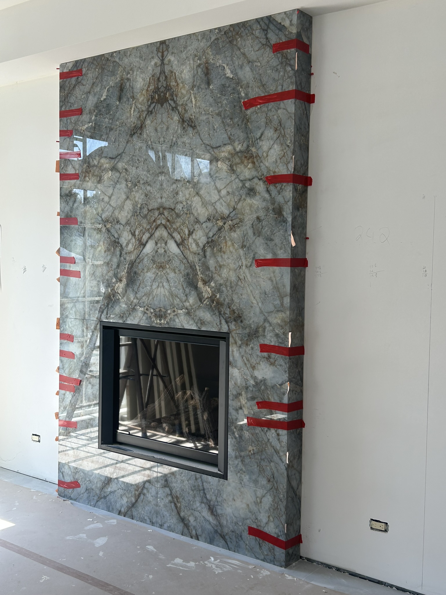 Matched bookmatched marble fireplace