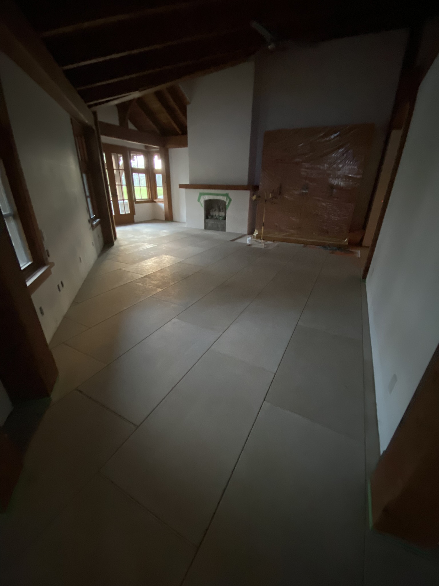 Large format floor tile in heritage home
