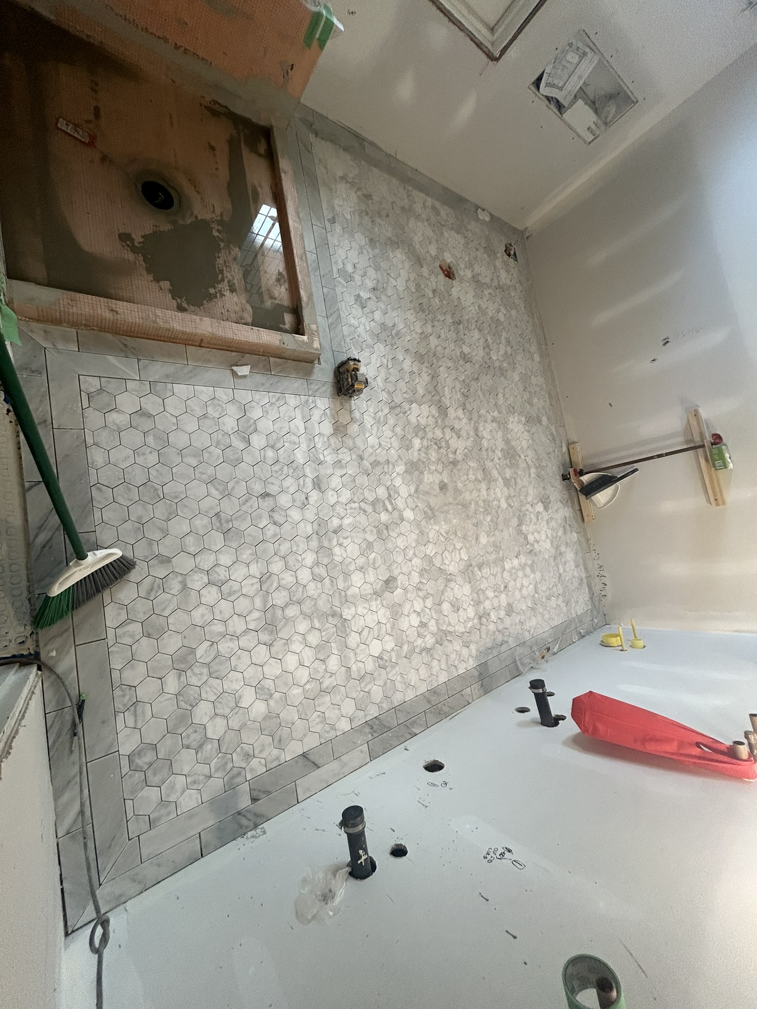 Marble hexagon floor bathroom renovation