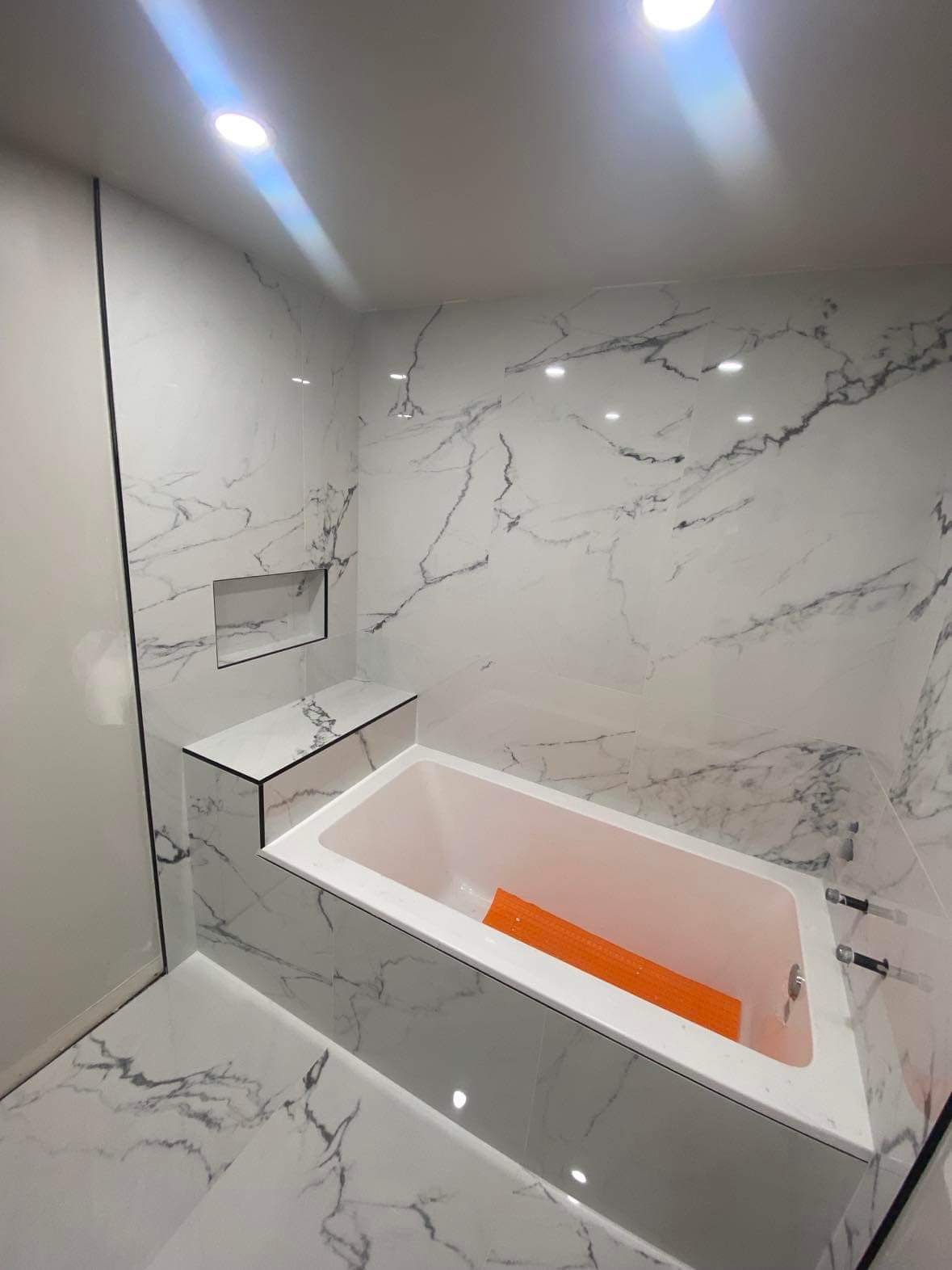 Full marble ensuite with soaker tub