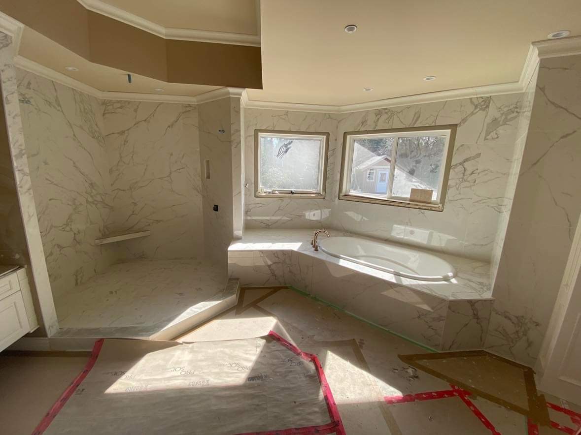 White marble fireplace surround floor to ceiling