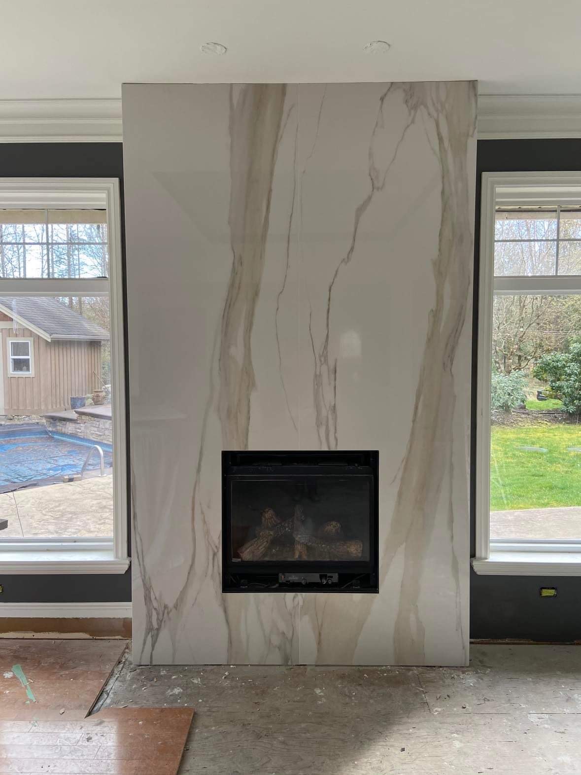 White tile shower with linear drain