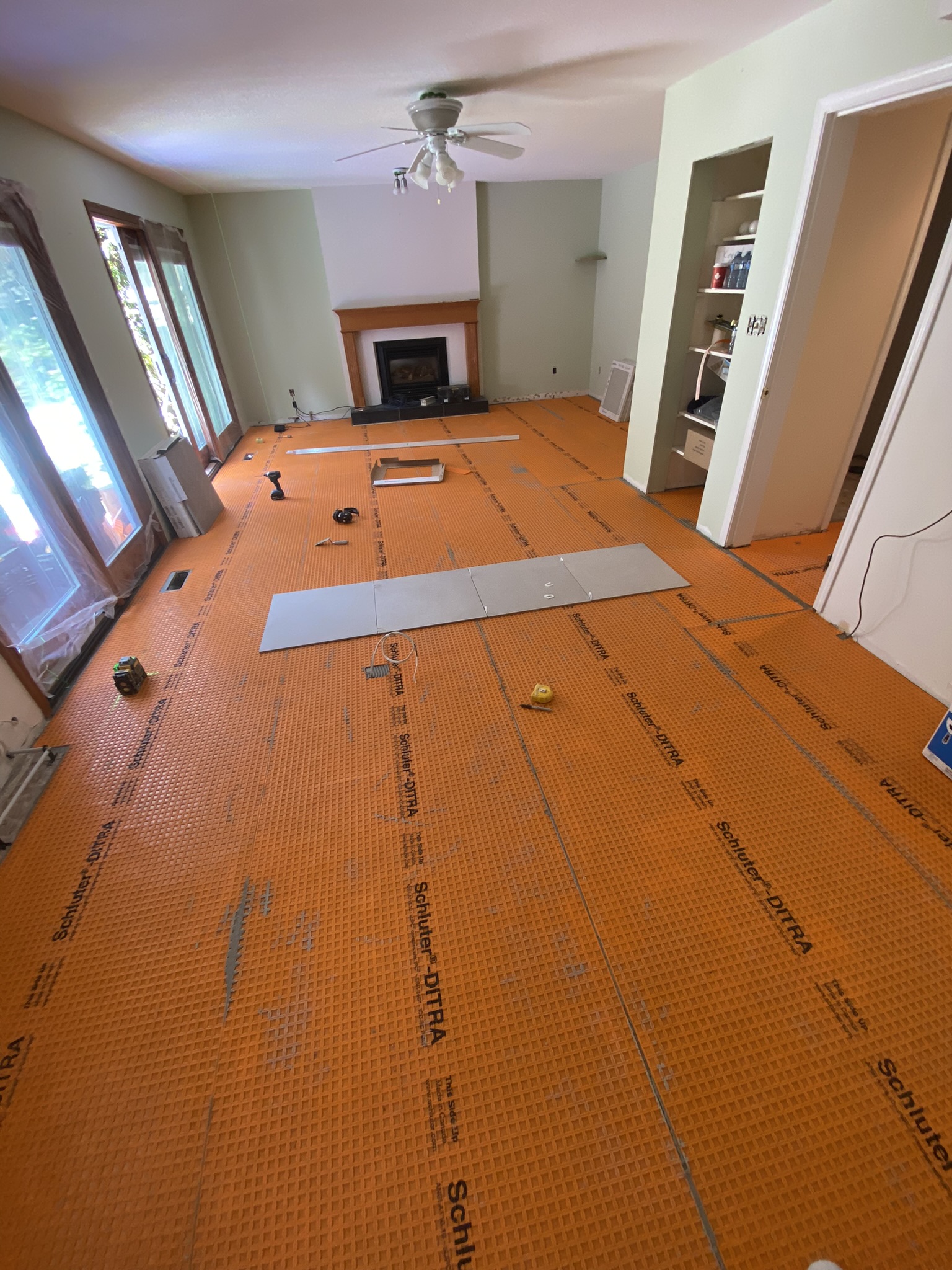 Schluter DITRA radiant floor prep living room
