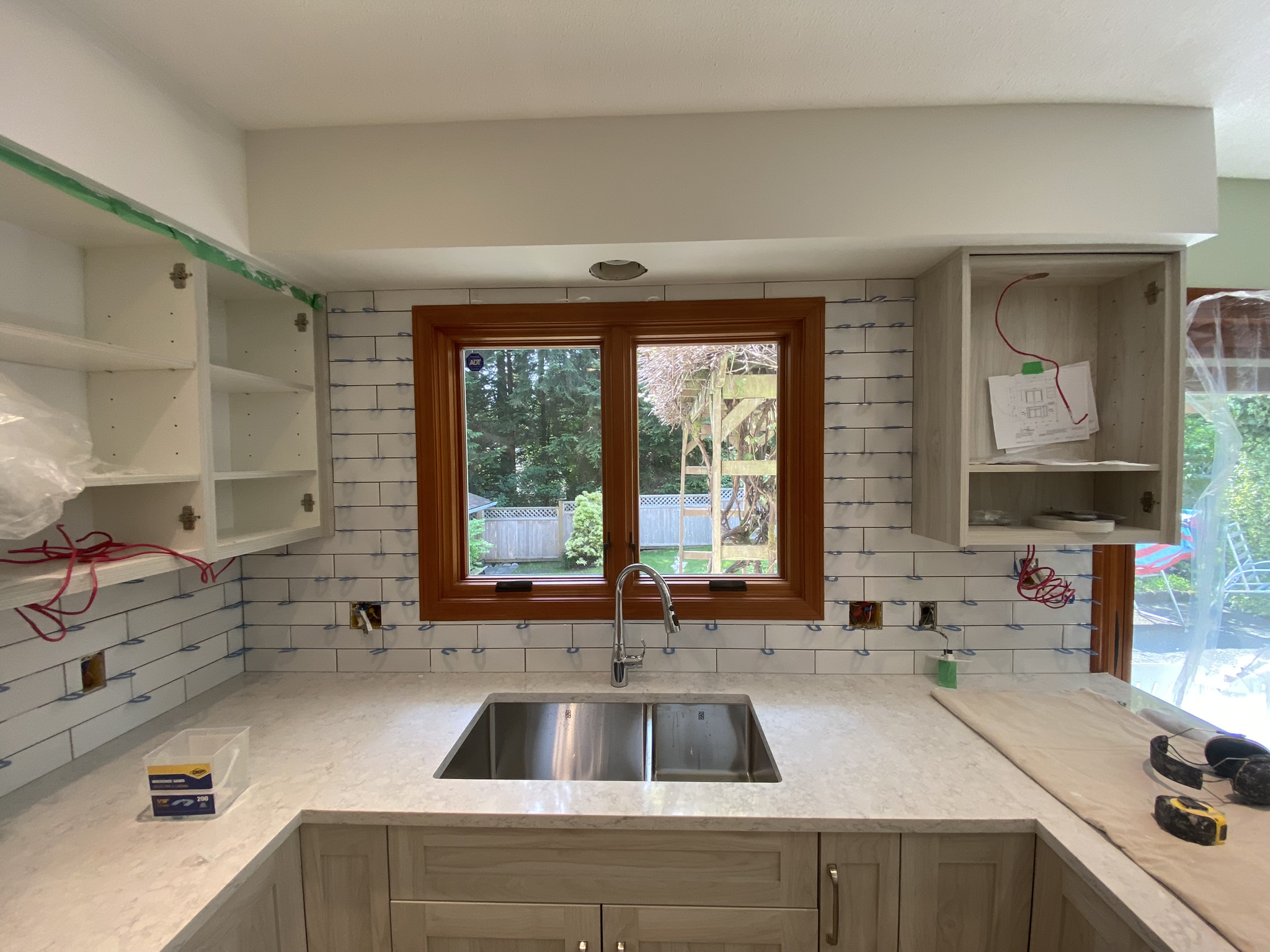 White subway tile kitchen backsplash renovation
