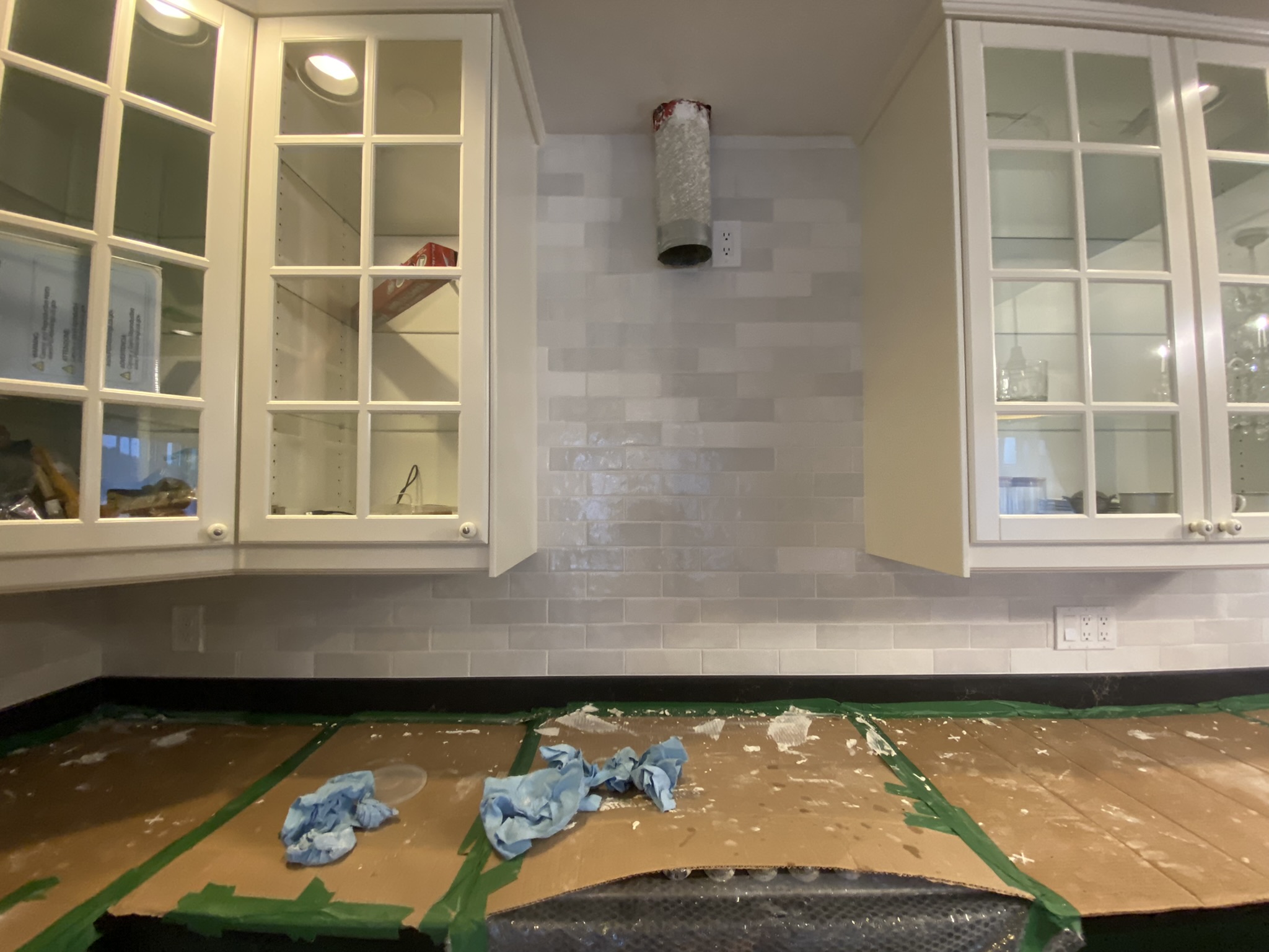 White zellige subway tile kitchen backsplash