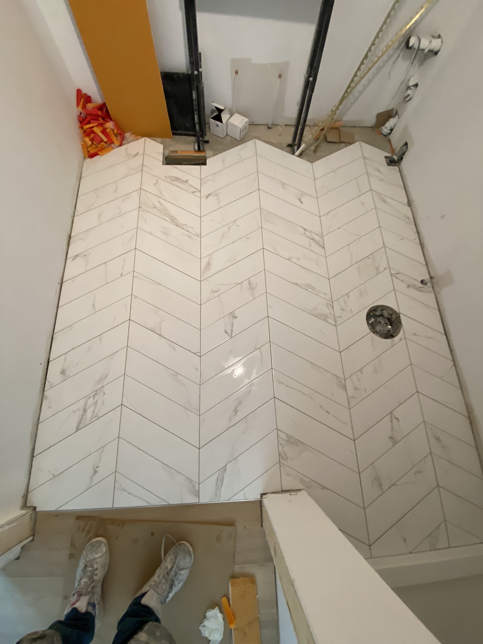 Marble chevron floor bathroom
