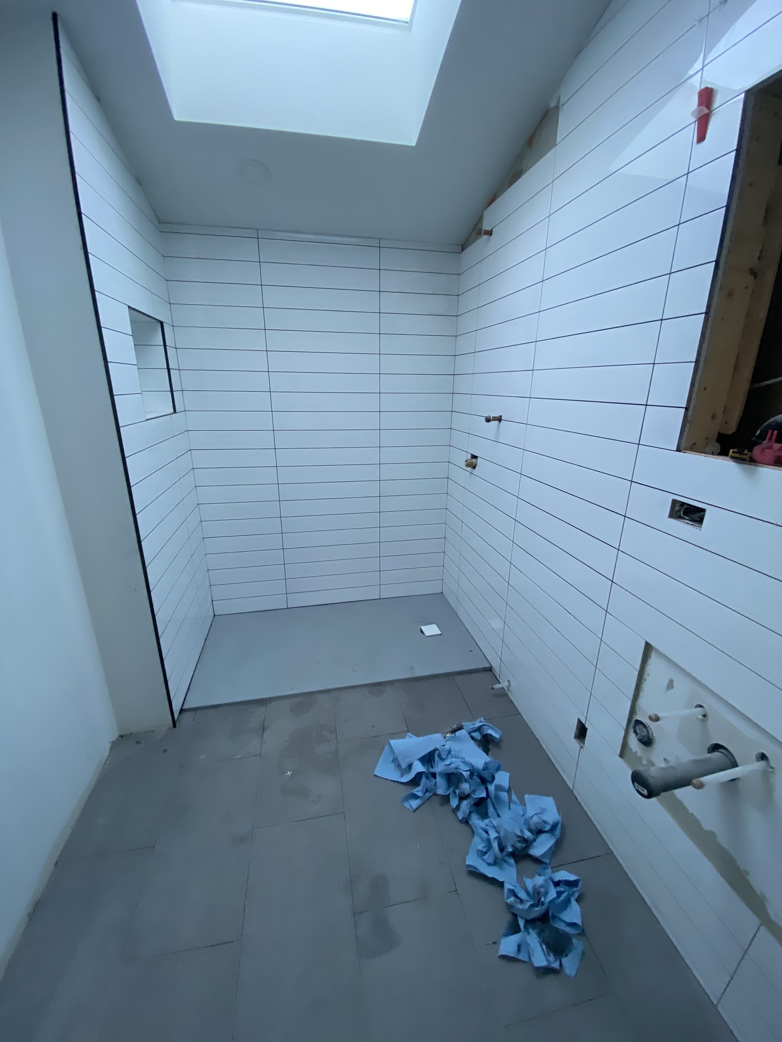 White large format shower with skylight