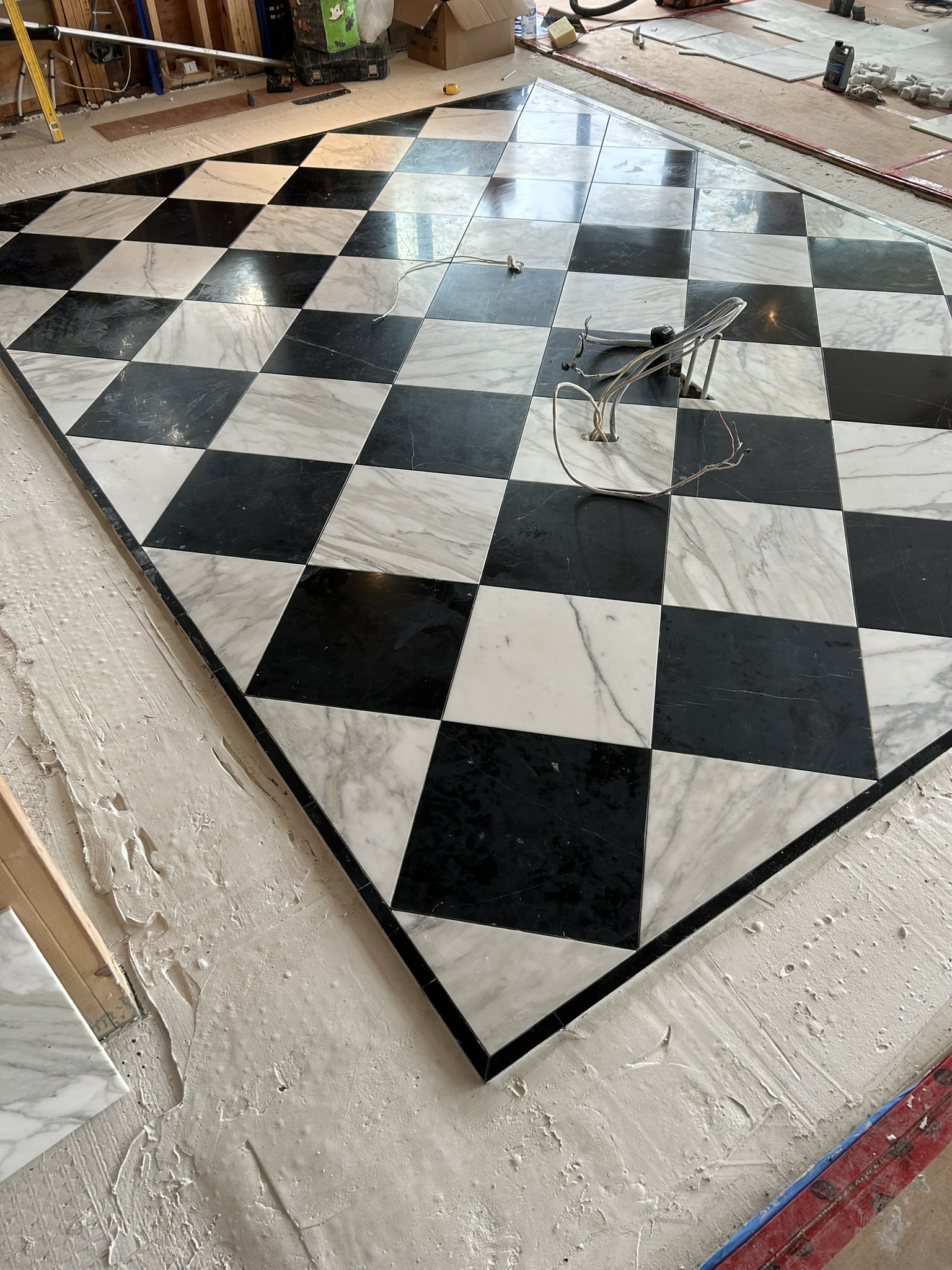 Black and white diagonal marble checkerboard floor