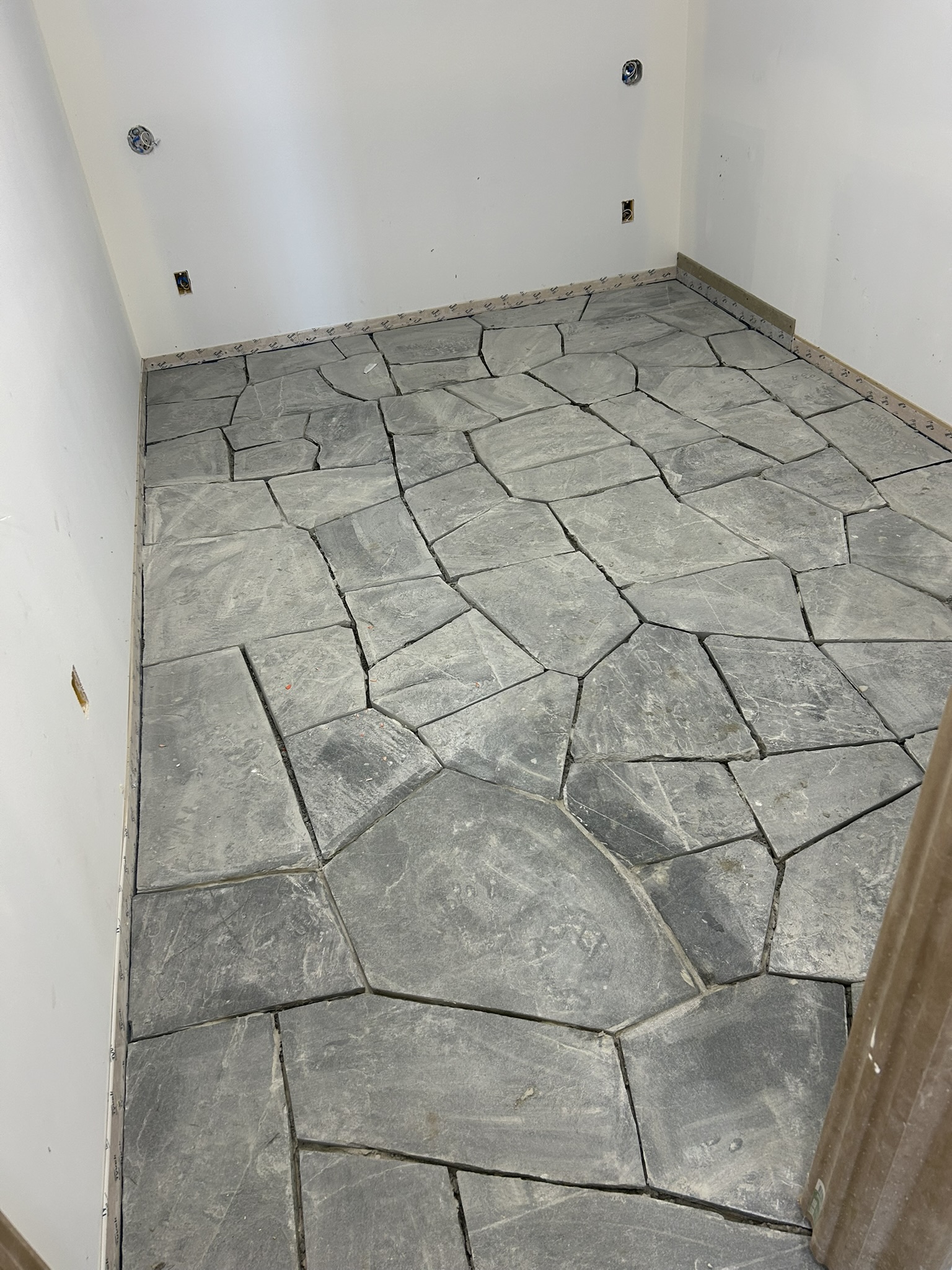 Irregular slate flagstone floor